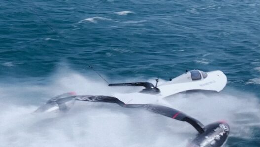 SP80's kite-powered sailboat, developed in partnership with Richard Mille, undergoing high-speed trials in Leucate, France, aiming to break the world sailing speed record.
