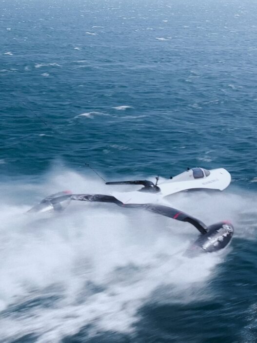 SP80's kite-powered sailboat, developed in partnership with Richard Mille, undergoing high-speed trials in Leucate, France, aiming to break the world sailing speed record.