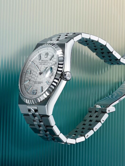 Rolex Land-Dweller 40 in platinum with ice blue honeycomb dial and Flat Jubilee bracelet.
