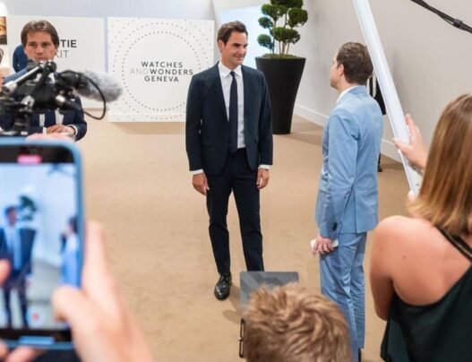 Roger Federer at the Rolex booth during Watches and Wonders 2025, wearing the newly unveiled Rolex Land-Dweller with a honeycomb-patterned dial